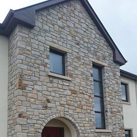 Building house facades using stone from our Leitrim sandstone Quarry