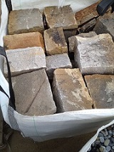 Cut Stone in random sizes bagged on a pallet